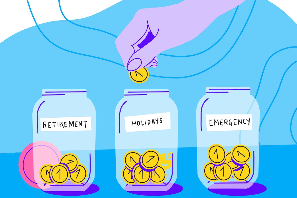 a female hand deposits loose change savings into a jar